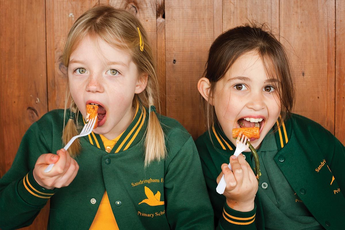 sandy east school kids eating pasta